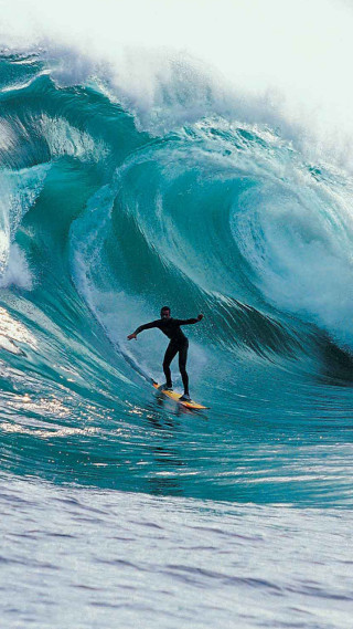 Man riding wave surfboard ocean 21 - large free wallpaper