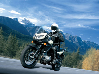 Man motorcycle road forest mountain - allen tupper true free wallpaper