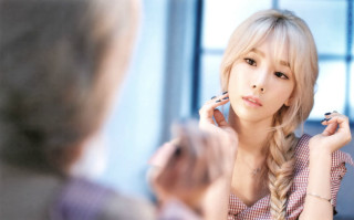 Woman reflection mirror brushing hair - porcelain skin free wallpaper