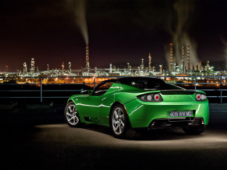 Green sports car city night - brenda chamberlain free wallpaper