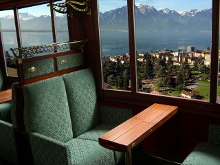 Train lake mountains bench foreground - a train car free wallpaper