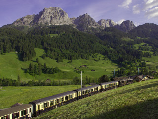 Train countryside mountain forest lush - a train traveling free wallpaper
