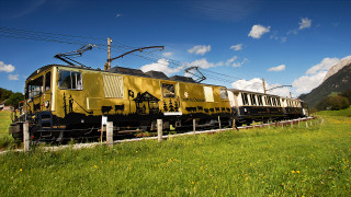 Yellow train green field sunny - track next free wallpaper