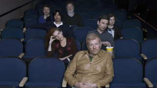 Theater group people drink cup - his hand and a woman holding free wallpaper