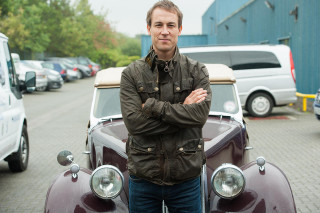 Man standing car parking lot - other car free wallpaper