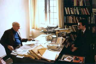 Two men sitting desk books - symbolist free wallpaper