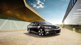 Black car parked building brick - a large window free wallpaper