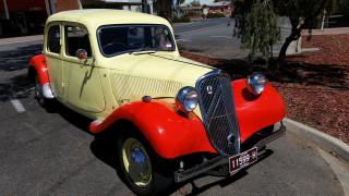 Yellow red car parked tree - the side of the road next free wallpaper