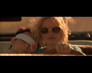 Man woman sunglasses looking distance - david macaulay free wallpaper