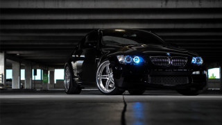 Black car blue lights parking - a parking garage free wallpaper for desktop