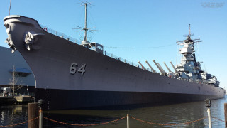 Large ship docked crane warship - front view free wallpaper