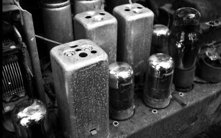 Old metal objects stacked shelf - a shelf in a room free wallpaper