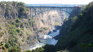 Train bridge river canyon mountain - a river below free wallpaper