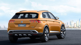 Yellow volkswagen suv parking lot - side profile free wallpaper