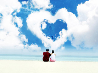 Couple beach heart shaped cloud 2 - a couple sitting free wallpaper