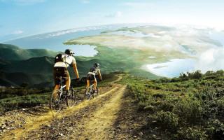 Couple biking dirt road lake 2 - a dirt road next free wallpaper