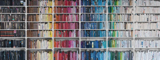 Large bookshelf filled books binders - book free wallpaper