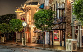 Clock pole city night building - a pole free wallpaper