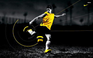 Soccer man kicking yellow shoe - foot free wallpaper