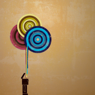Colorful paper pinwheel brown yellow - surreal free wallpaper for tablet