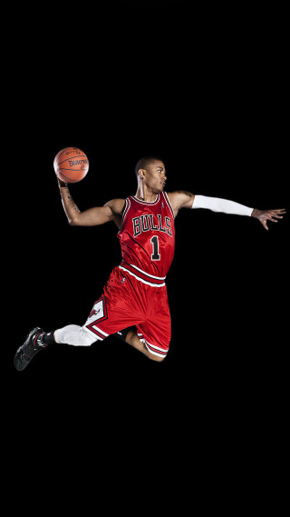 Man red uniform jumping basketball - real free wallpaper for mobile