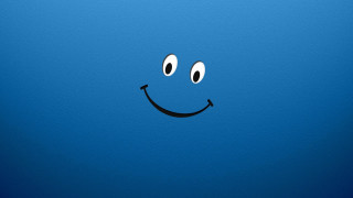 Blue background smiley face black 2 - a smiley face free wallpaper for desktop