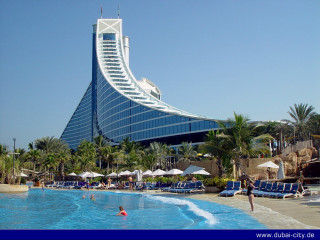 Large building pool people swimming - a pool in front free wallpaper