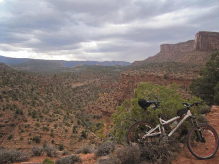 Mountain bike cliff valley mountains - liminal space free wallpaper