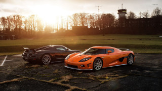 Orange sports cars parking lot - sunrise time free wallpaper