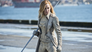 Woman leather outfit sword stick - a leather outfit holding free wallpaper