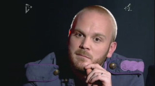 Man uniform serious look hand - his chin free wallpaper