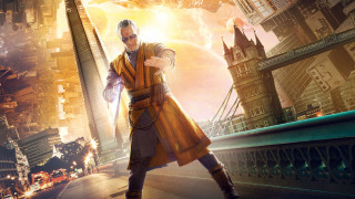 Man yellow coat sunglasses cityscape - a cityscape free wallpaper