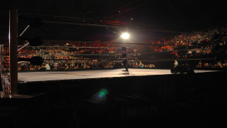 Man wrestling ring night crowd - the sideline free wallpaper