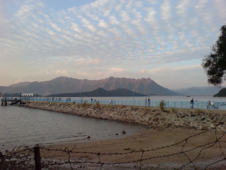 Beach group people water mountains - a beach next free wallpaper