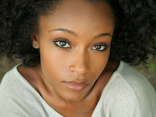 Woman black hair curly portrait - a black hair free wallpaper