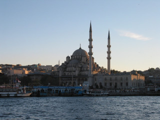 Large building spire water boats - panoramic free wallpaper