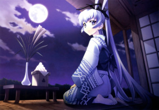 Woman sitting building sky full - the ground in front free wallpaper