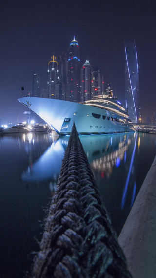 Boat docked harbor night city - free ship wallpaper for mobile
