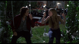 Man woman swing park night - elysium free wallpaper