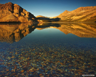 Mountain range reflection still lake 5 - a clear sky above free wallpaper
