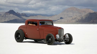 Red car desert mountains cloudy 2 - dee whitcomb free wallpaper