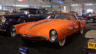 Cars display building sign - display in a museum free wallpaper