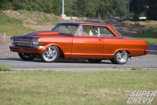 Orange car street grass trees - an orange car free wallpaper for desktop