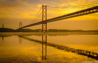 Bridge water sky clouds yellow - a yellow sky free wallpaper