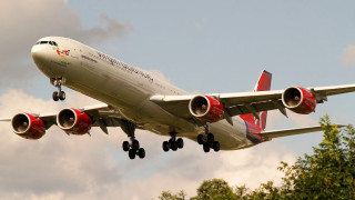 Jetliner cloudy sky trees bushes - a red tail free wallpaper