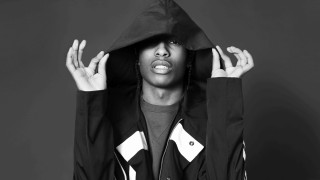 Man black jacket hands face - darrell riche free wallpaper