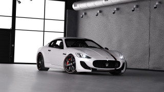 White masera parked garage wall - a wall free wallpaper
