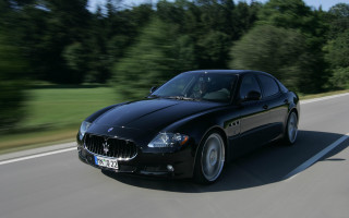 Black car driving road forest 8 - motion blur free wallpaper