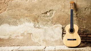 Guitar stone wall brick background - a brick wall behind free wallpaper