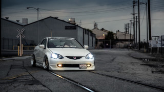 White car street train track - a white car free wallpaper